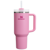 Stanley 1913 Quencher H2.0 tumbler in pink with handle, white lid, and straw on white background