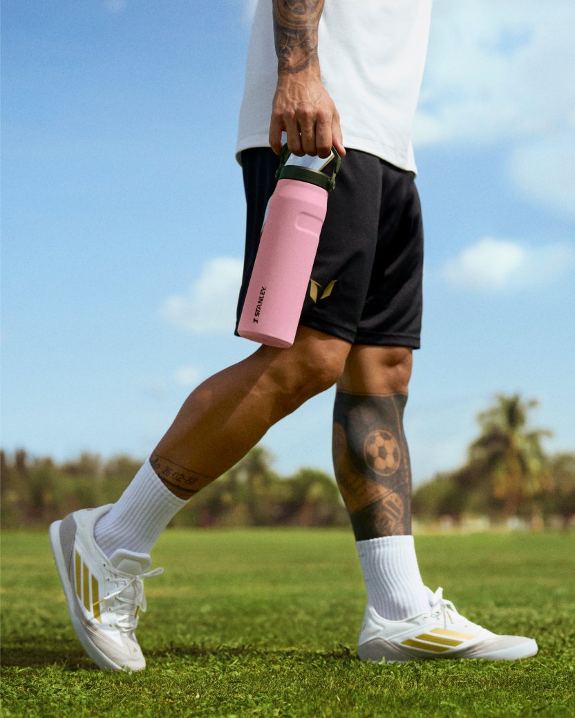 Leo Messi holding a Stanley water bottle, staying hydrated in the gym, on the pitch, and with his kids